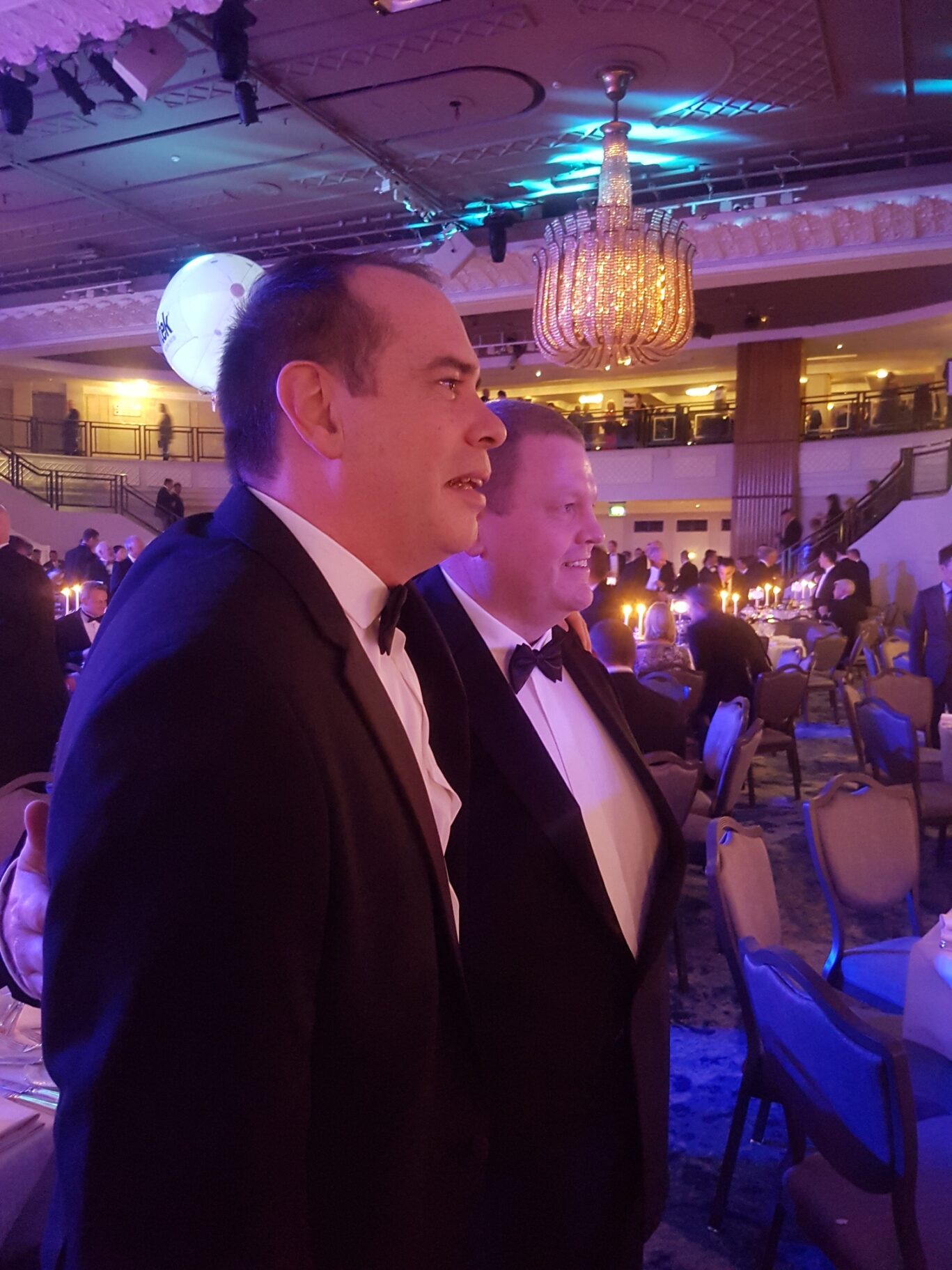 B-Tech representatives attending the AV Awards 2017 ceremony beneath the event lighting.