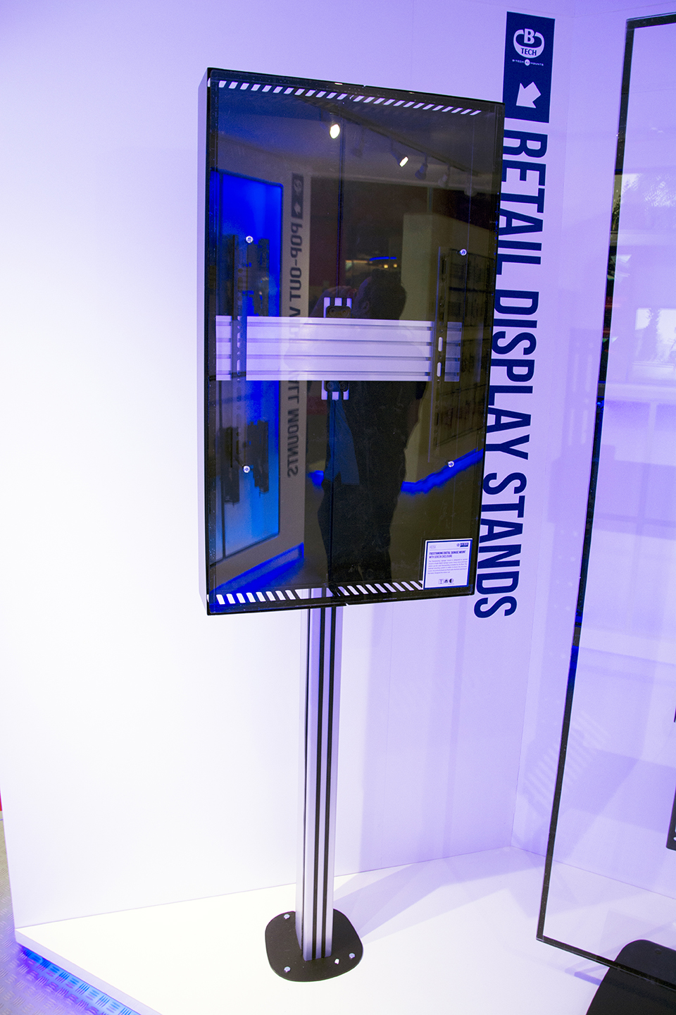 View across the B-Tech exhibition stand showing a range of professional AV mounting applications.