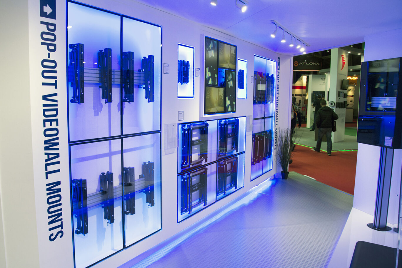 Product wall showcasing B-Tech AV mounting solutions and professional installation hardware.