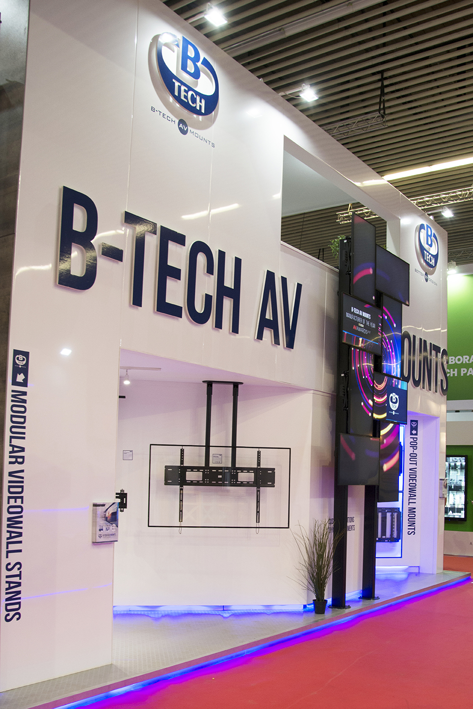 Close-up view of B-Tech AV Mounts branding and product displays at ISE 2018.