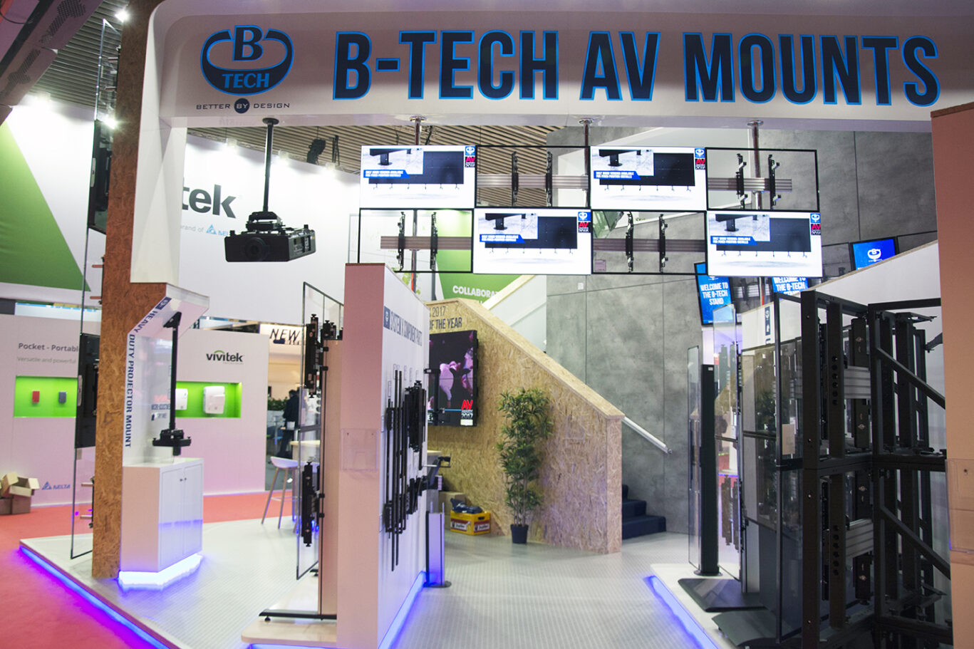 Visitors explore B-Tech AV mounting solutions and display technology at the ISE 2018 exhibition.