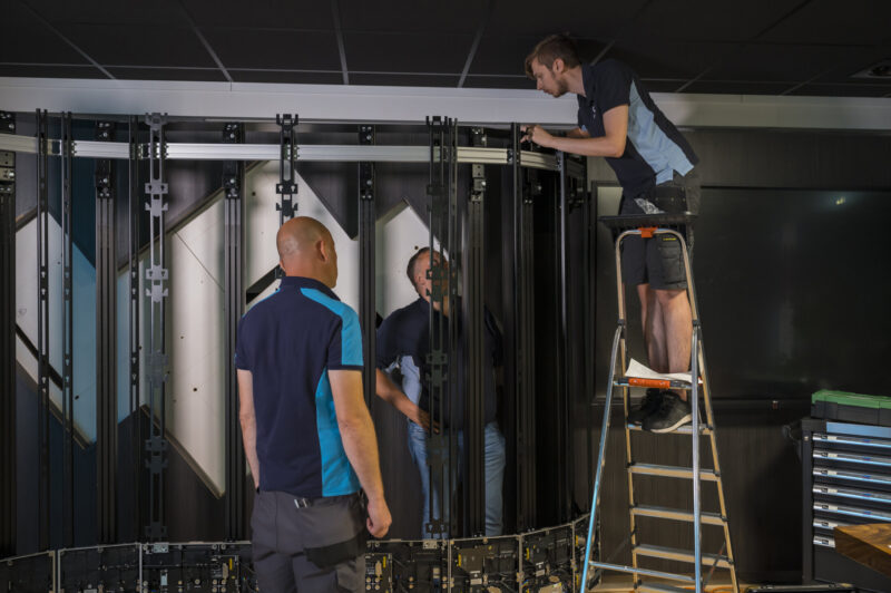 B-Tech AV Mounts installers assembling a large dvLED mounting structure