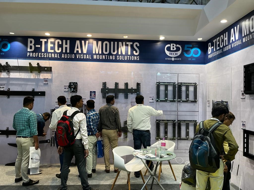 An image of a group of men testing B-Tech's range of wall mounts