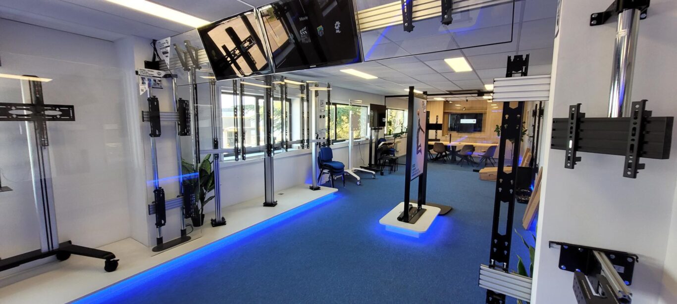 B-Tech Belgium product showroom featuring AV mounting solutions, digital signage displays and collaboration systems.