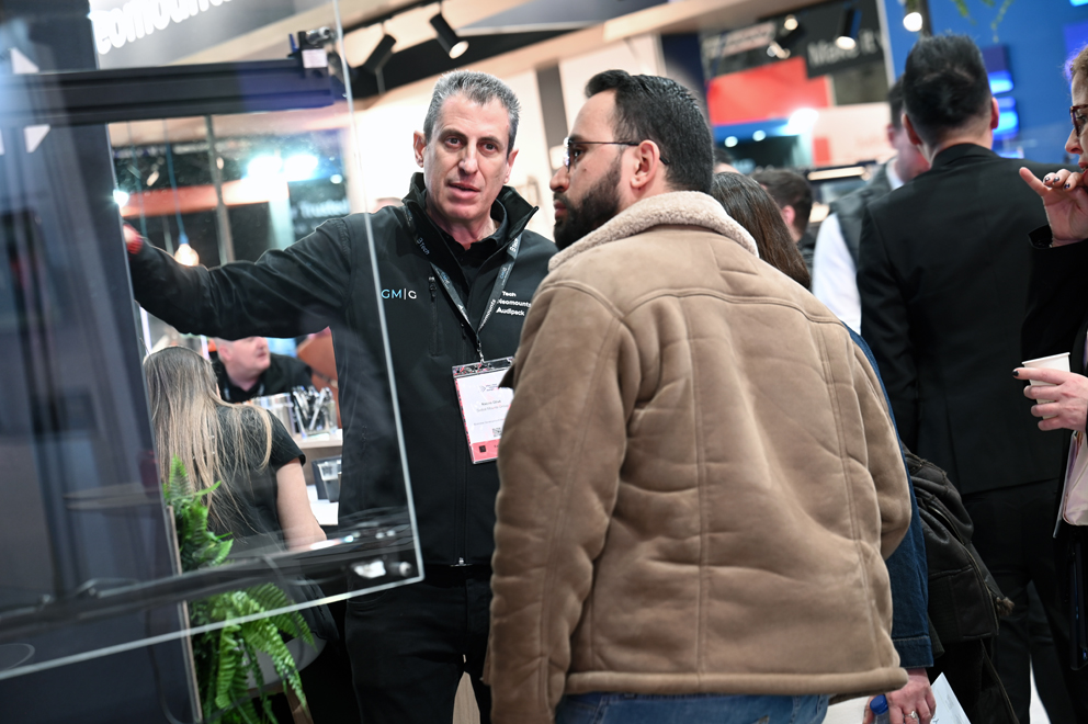 B-Tech exhibition stand featuring digital signage and professional AV mounting solutions at ISE Barcelona