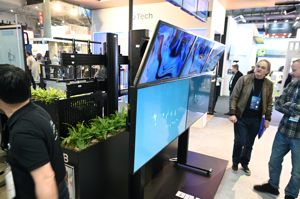 B-Tech exhibition stand featuring digital signage and professional AV mounting solutions at ISE Barcelona