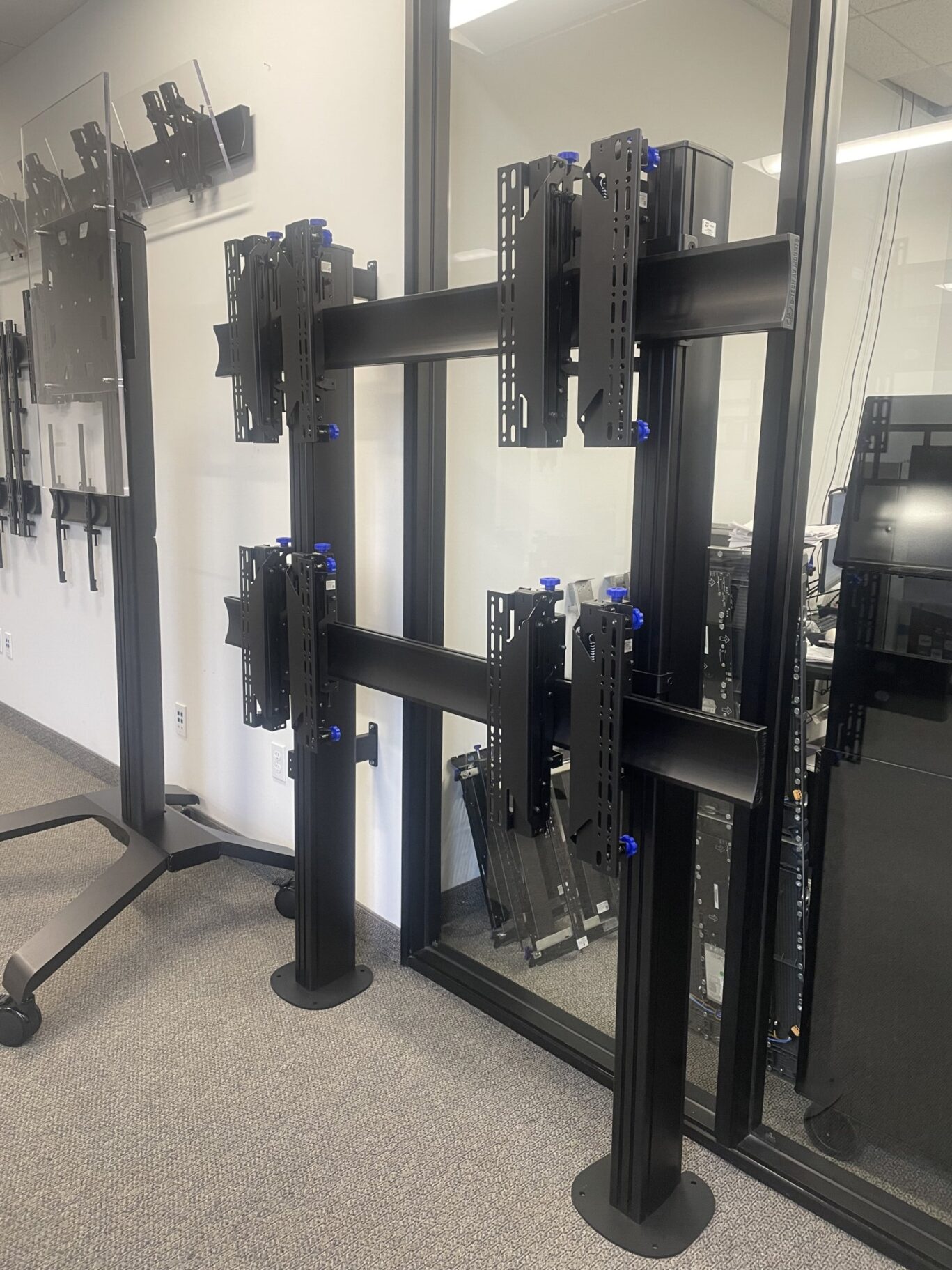 B-Tech North America product showroom featuring AV mounting solutions, digital signage displays and collaboration systems.