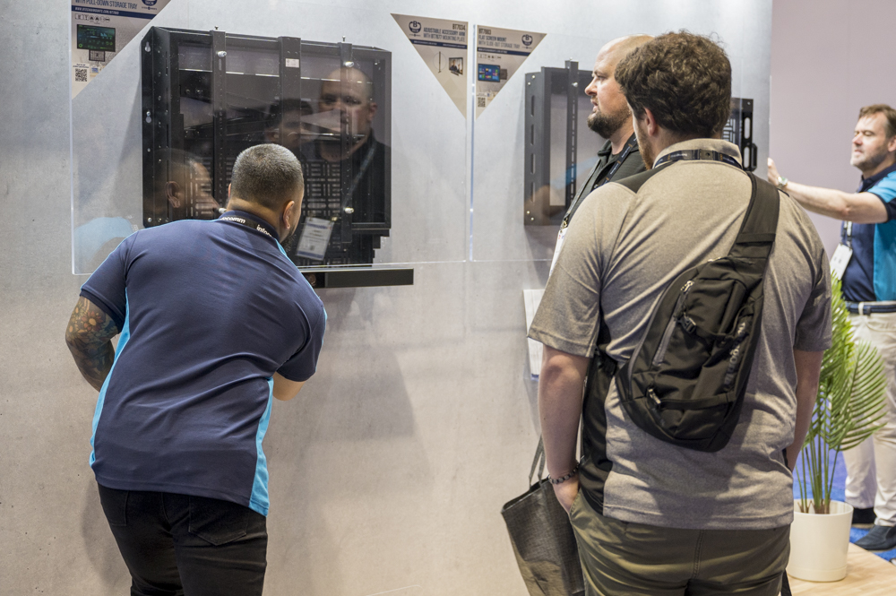 An image of B-Tech AV Mounts Salesperson Joan Lem demonstrates our new BT7034 Mounting arm
