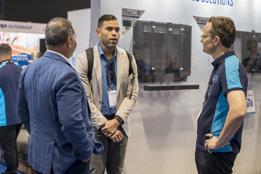 An Image of two B-Tech Sales reps speaking to a new customer