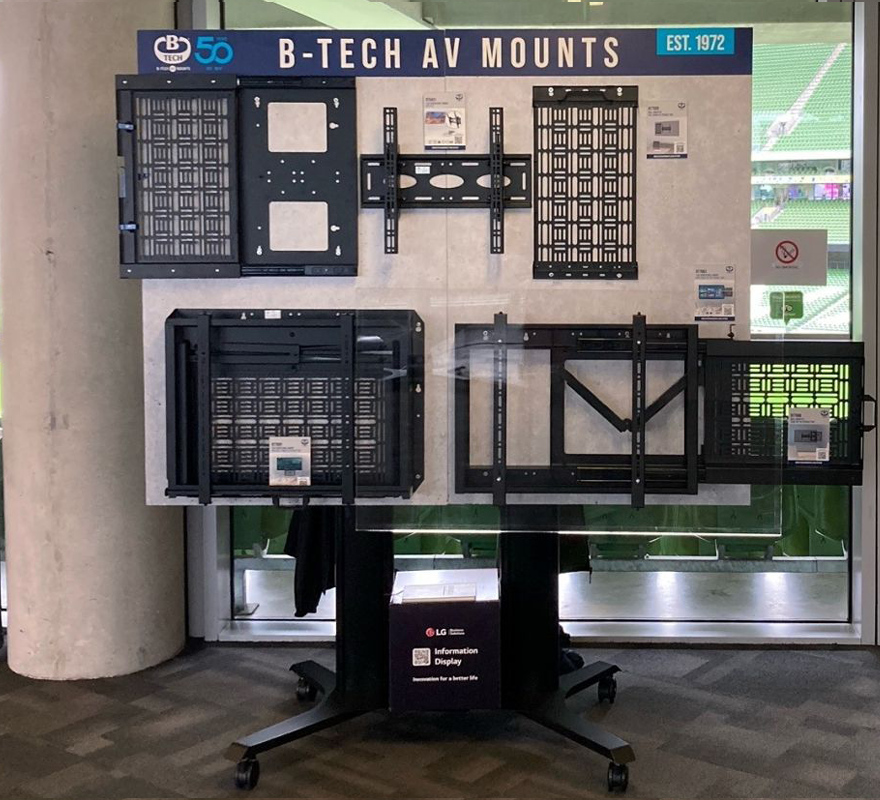 An image of a B-Tech AV Mounts wall mount Display set up on a Modal trolley.