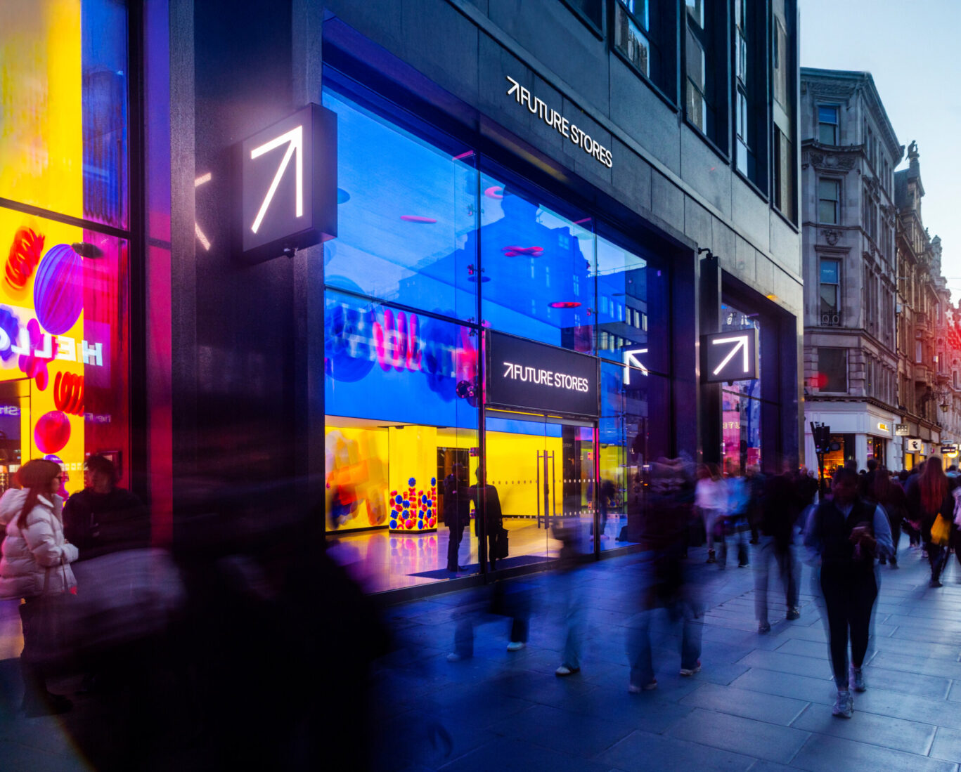 Exterior of Future Stores in London with illuminated digital displays