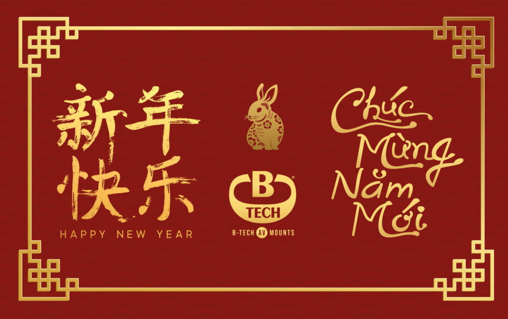 An image in Mandarin, Vietnamese and English giving a happy lunar new year.