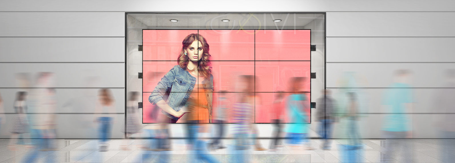 A lifestyle showing a 3x3 System-X 3X3 LCD Wall to Wall Display mount